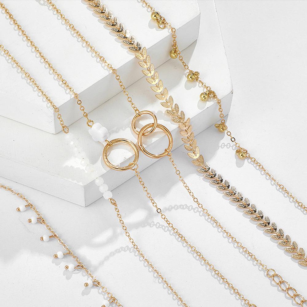 Pakke med Boho Armbånd i Guld