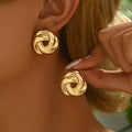 Elegant og chic guld spiral øreringe