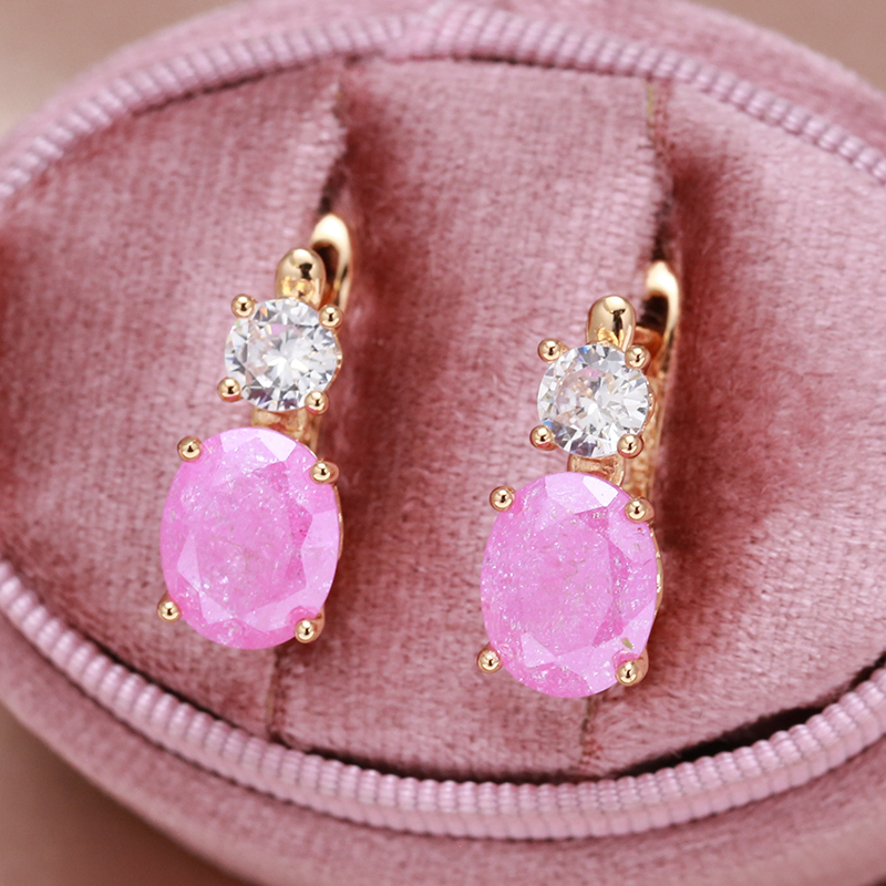 Elegante øreringe med pink zirkonia i guld