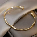 Elegant Gylden Åben Armbånd