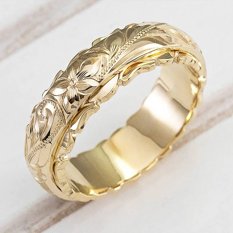 Vintage guld ring med naturligt mønster