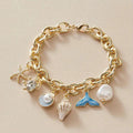 Ocean Shells Gyldne Armbånd